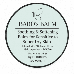 Babo's Balm herbal balm for dry skin in open jar, shea butter and herb-infused salve